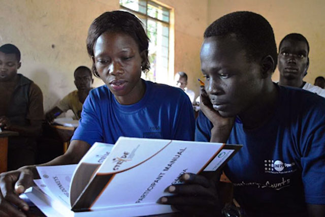 Young students learning the basics of entrepreneurship in Uganda