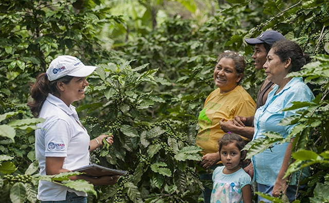 Diana Peralta training coffee farmers in Latin America