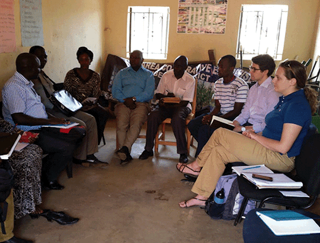 TechnoServe Fellow in Uganda meets with representatives of a coffee cooperative