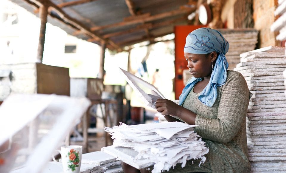 Woman working hard in Uganda