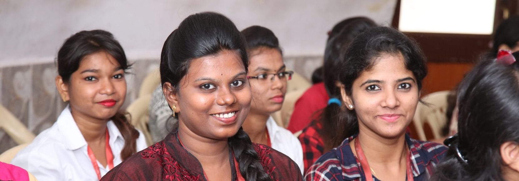 Smiling women at conference in India