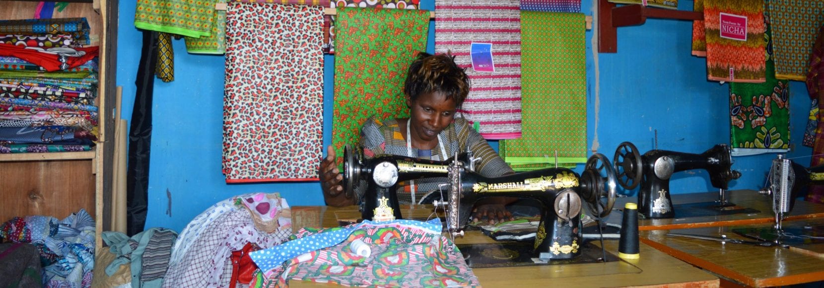 Immaculee Ndagijimana owns a tailor shop in Rwanda’s Nyanza district.