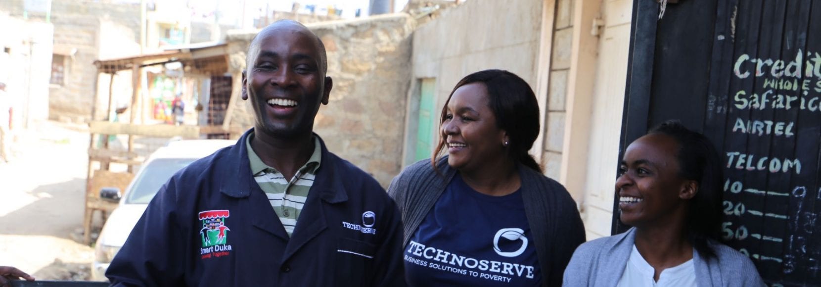 Duka owners smiling in Kenya