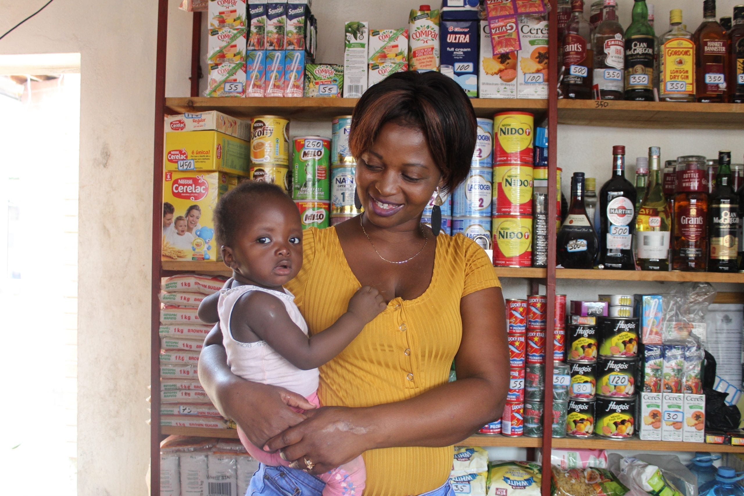 Many women leaders in developing countries are also mothers, like Bernadette Sambo who owns a small grocery store near Maputo, Mozambique.