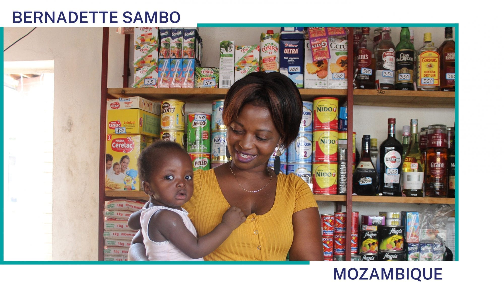 Bernadette Sambo holds her child in her shop in Mozambique