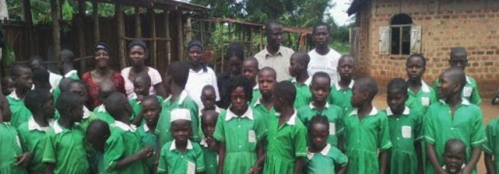 Group of kids and teachers in Uganda