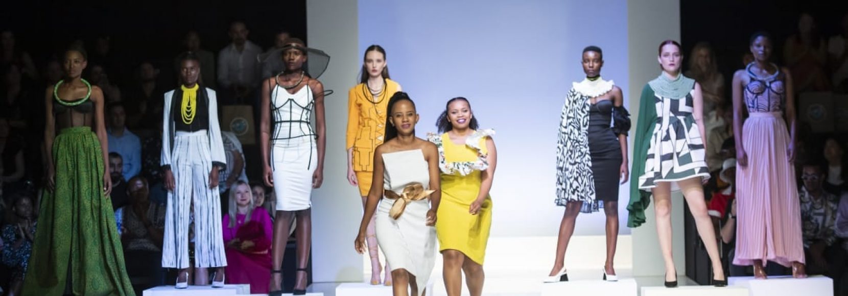 Models on the runway at a fashion show during South Africa Fashion Week 2019