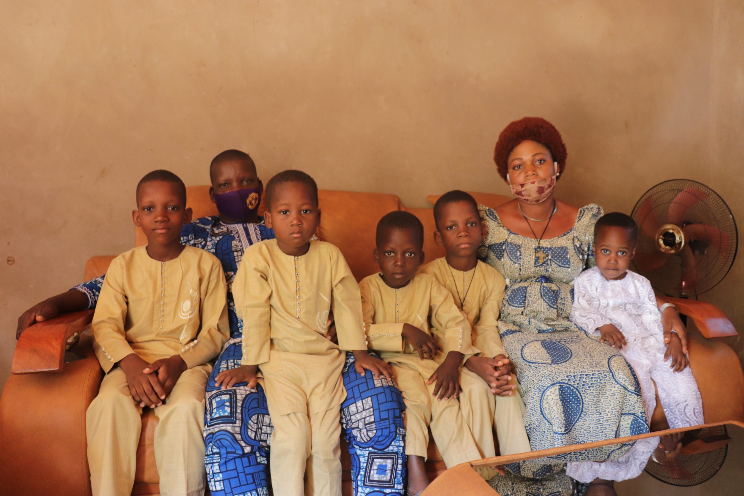 Entrepreneur Virginie Adounon with her family in Bohicon, Benin