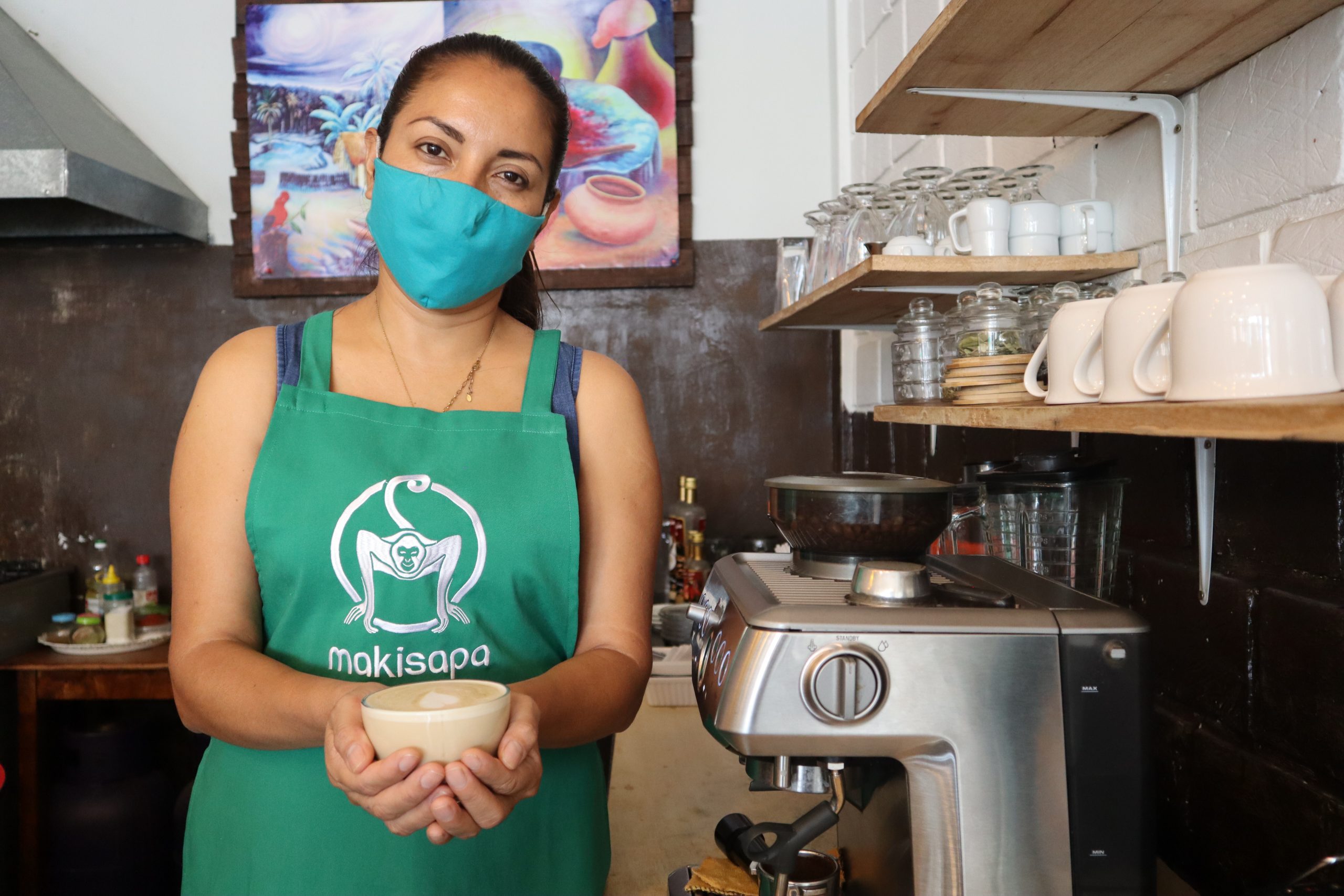 Juliana Solis Baron stands in her coffee shop in Peru's San Martin region
