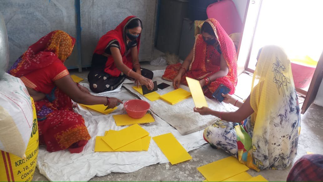 Women entrepreneurs in India create yellow sticky traps as a microenterprise development opportunity. 