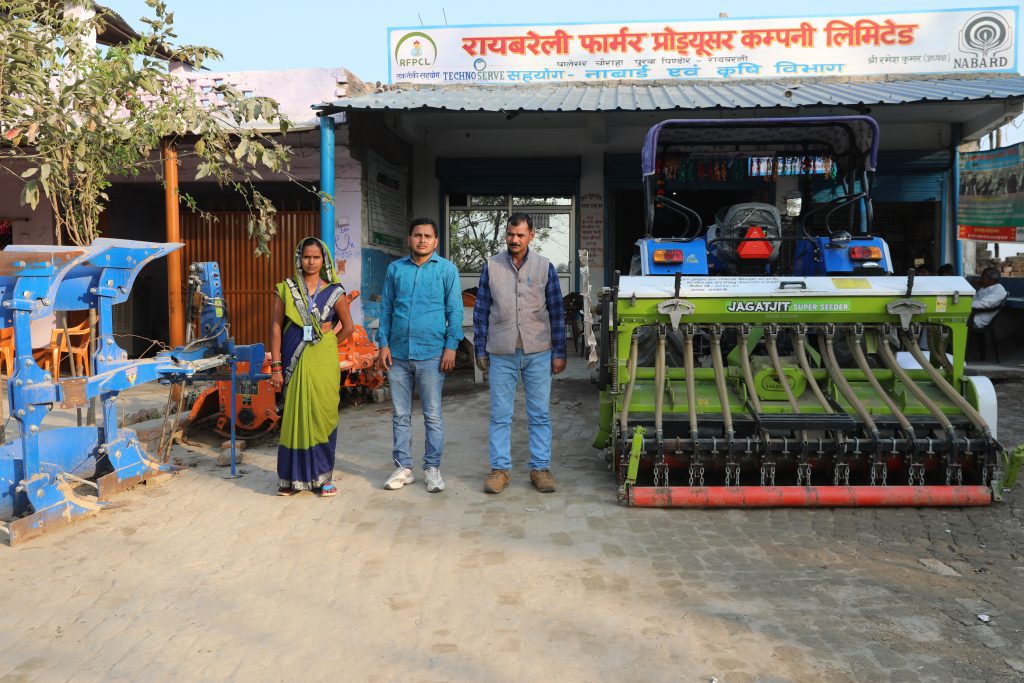 Prema and other FPO directors with a Super Seeder Machine that their company recently purchased for use by the company shareholdersPrema and other FPO directors with a Super Seeder Machine that their company recently purchased for use by the company shareholders