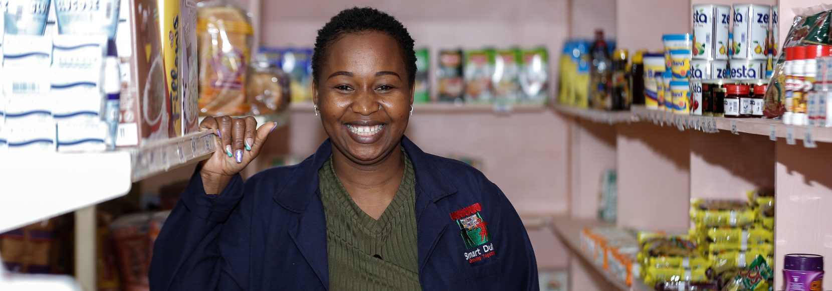 Sarah Kavuli, a micro-retailer, at her store Kikwetu Minimart