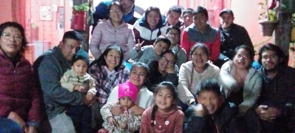 Photo of TechnoServe staff and their family. Part of the staff reflections on being grateful. 
