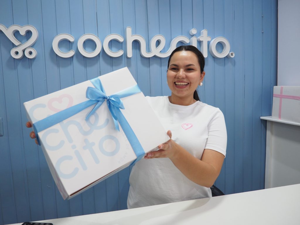 Nieves Rocio Requeno owns Cochecito, a baby clothing boutique in San Salvador, El Salvador. (TechnoServe / Julieta Ocampo). 