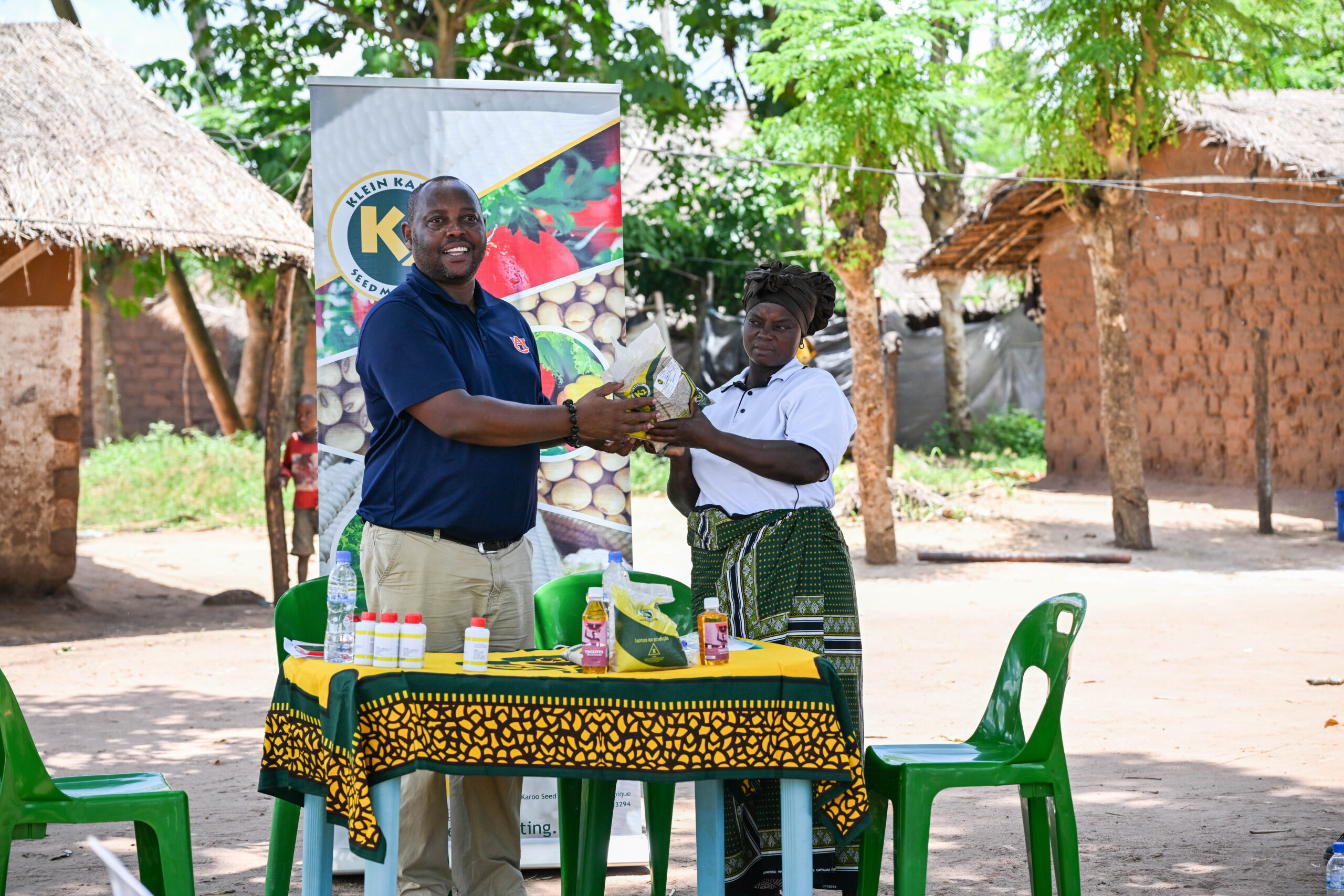 Kendo Mangule of Agrifeed with NIVENHE President Rozinha Feliciano at the seed ceremony.