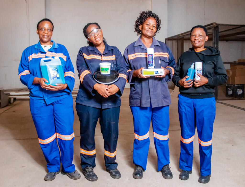 From left to right: Baikanne Toteng, Gofaone Botshelo, Stephinah Gaanakobo, and Kenyatsegile Gotewang stand with their cleaning products. 